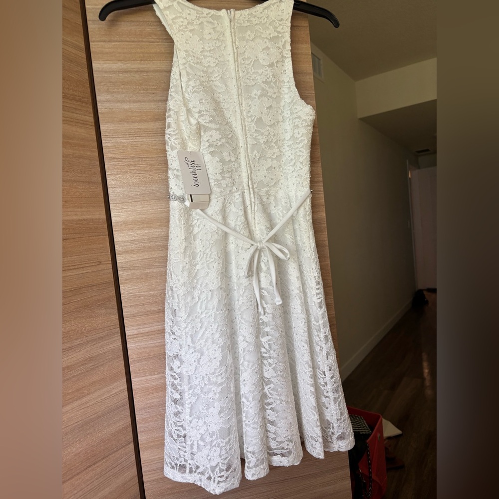 White girls dress. Size 14. New with tags